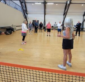 Pickleball Terry at her pickleball clinic with students in Sarasota, FL